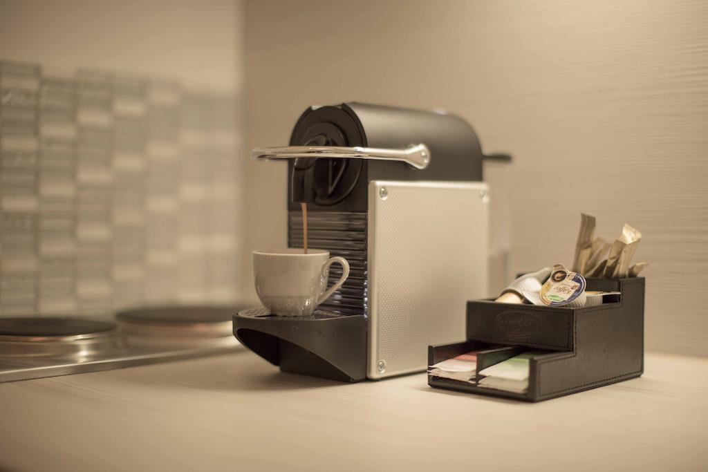 Helvetia Suites Düsseldorf Pokoj fotografie