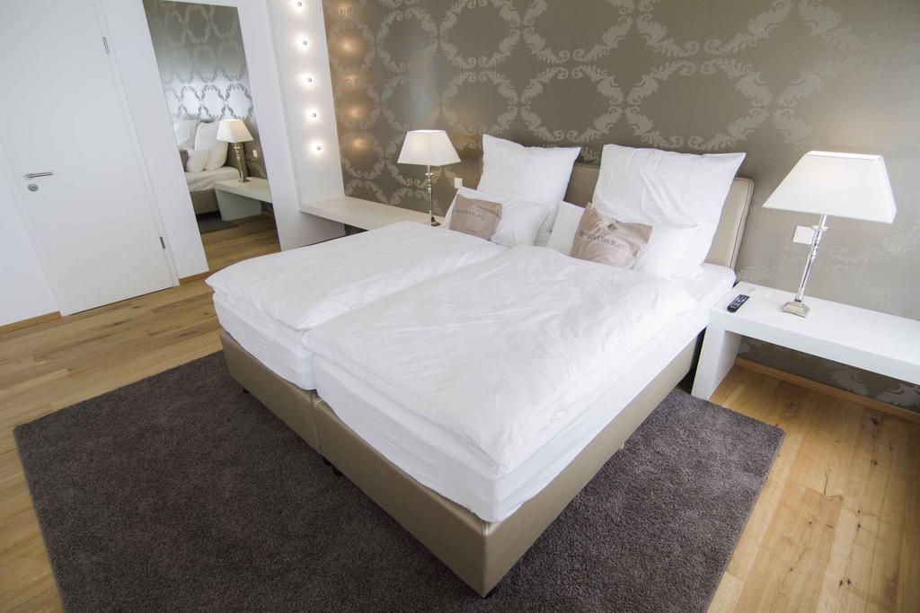 Helvetia Suites Düsseldorf Pokoj fotografie