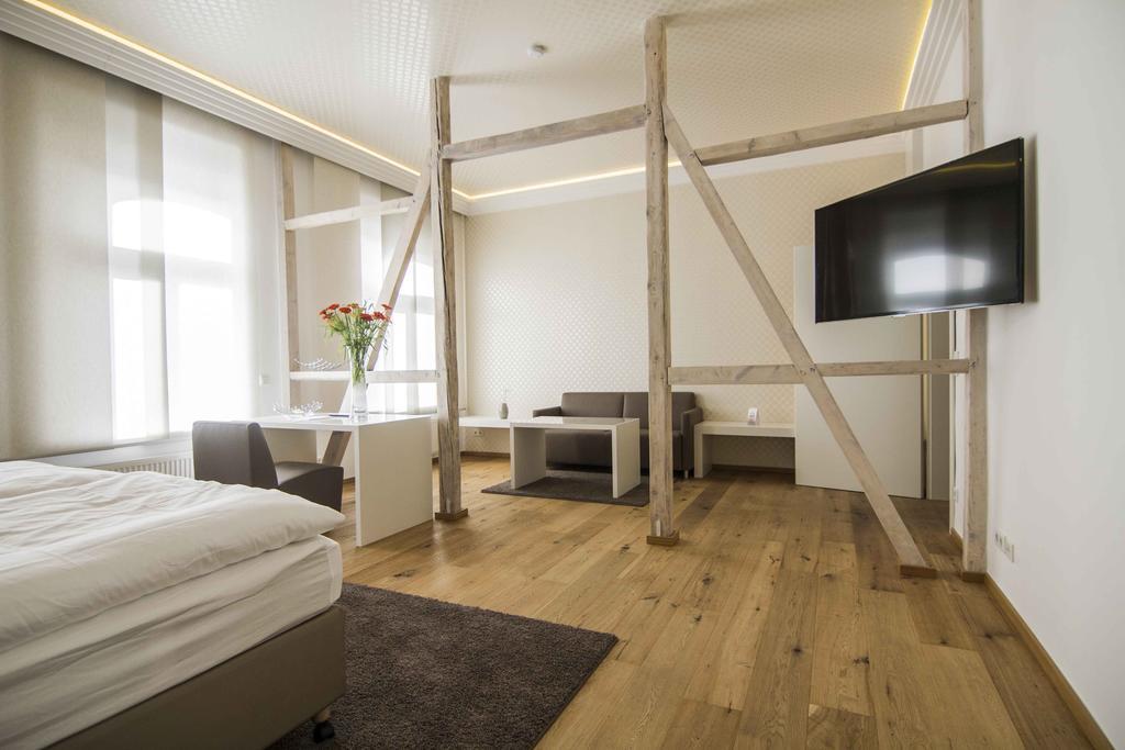 Helvetia Suites Düsseldorf Pokoj fotografie