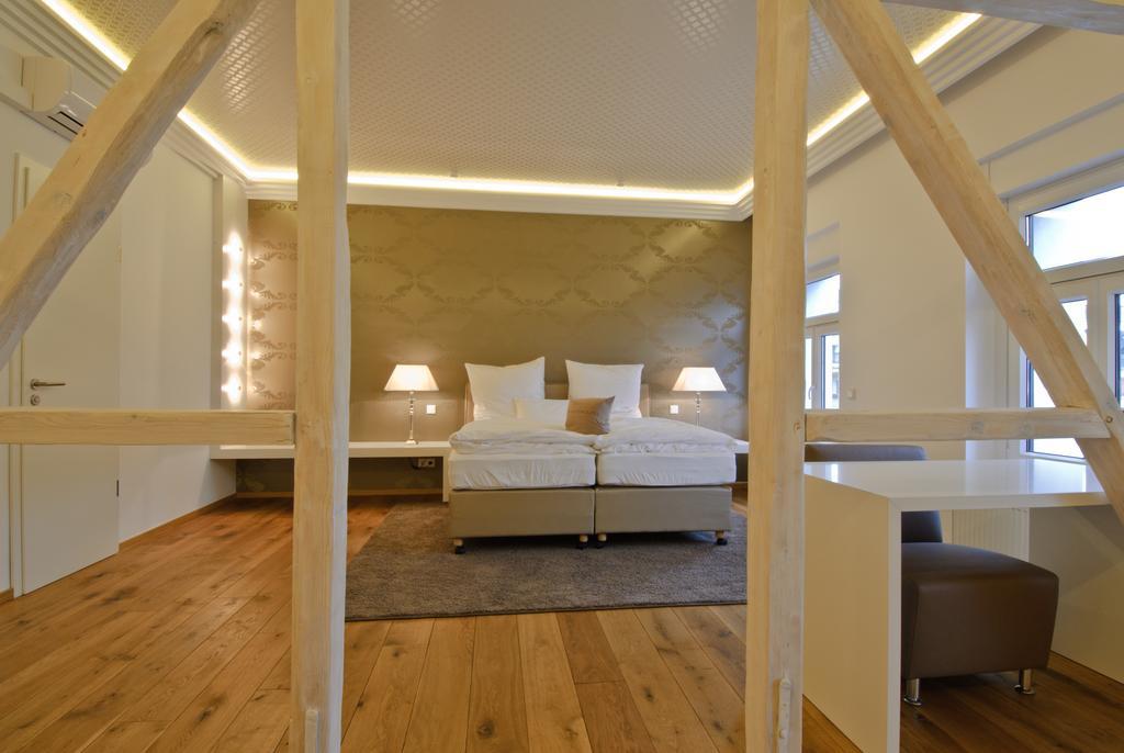Helvetia Suites Düsseldorf Pokoj fotografie